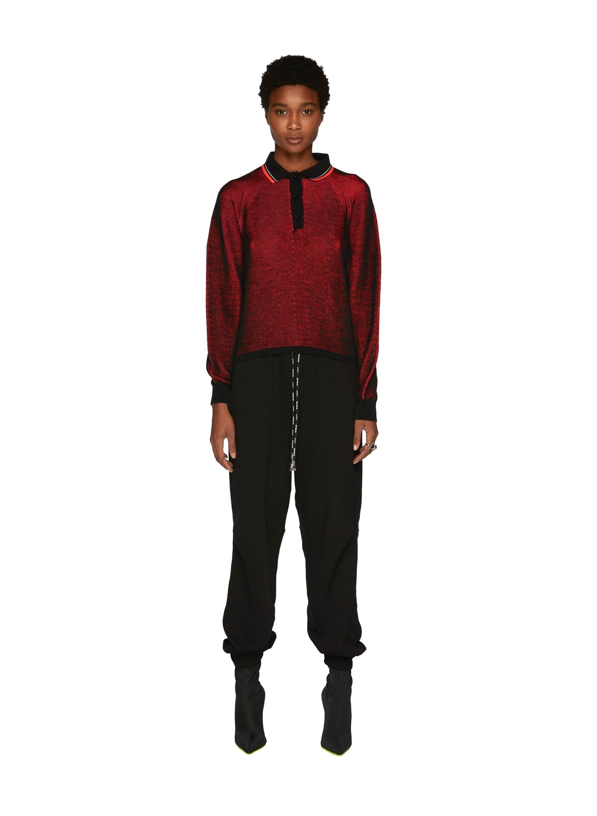 Red Knit Lines Maxi Polo with black collar and cuffs, paired with relaxed black trousers and sleek ankle boots - Byblos style.