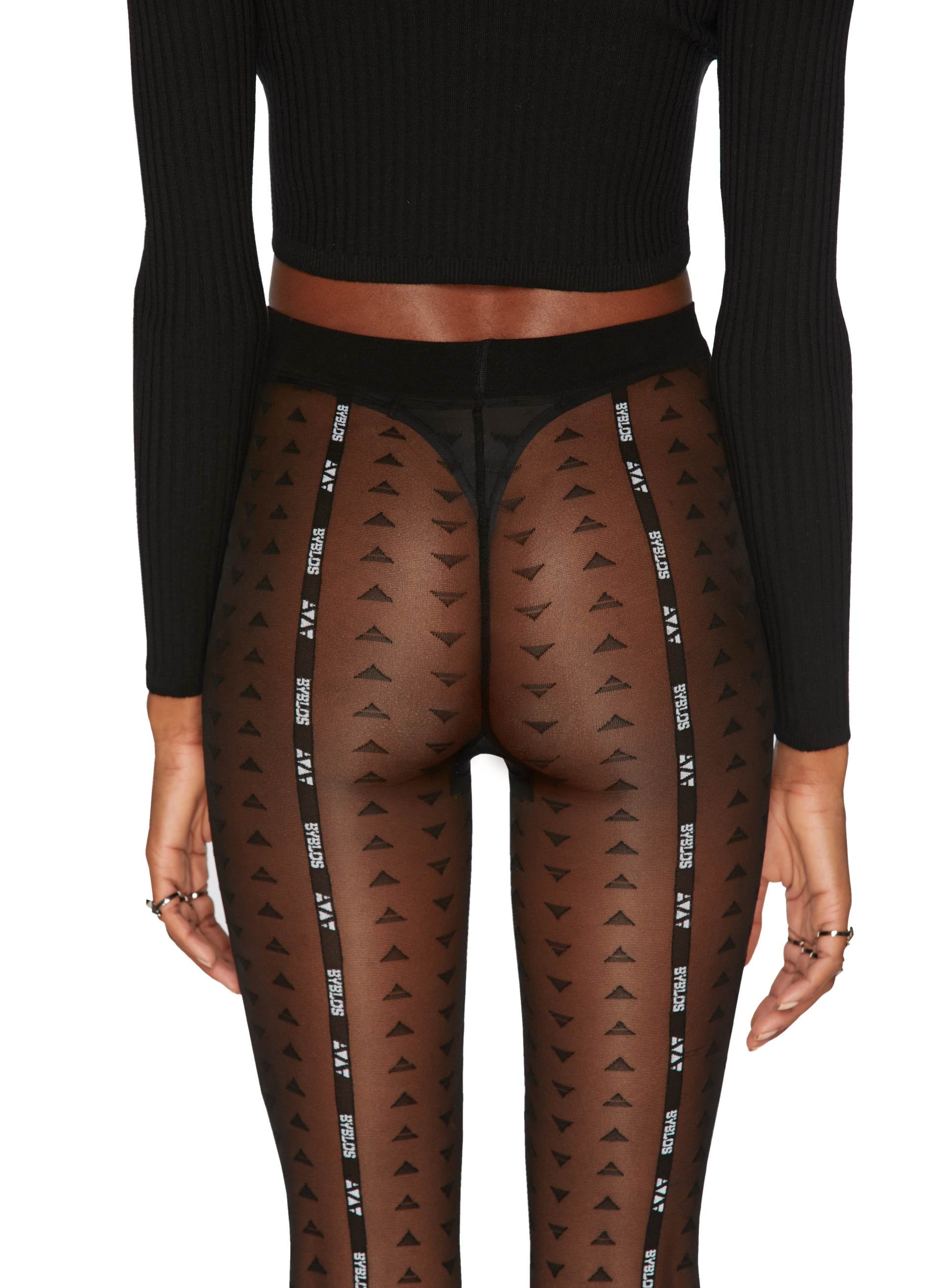 Triangles See-Through Tights featuring a geometric arrow pattern and Byblos logo detailing, paired with a fitted ribbed crop top.